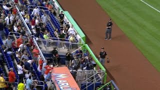 Celebrity ARI@MIA: Young fan leans over dugout to make catch Wealth