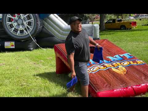 Giant Inflatable Corn Hole | Sky High Party Rentals