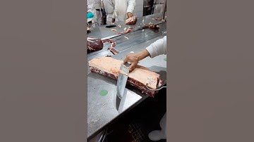 Trimming the fat on the meat production line with a very sharp knife! 🔪🥩🤯 With @juan.lombard0