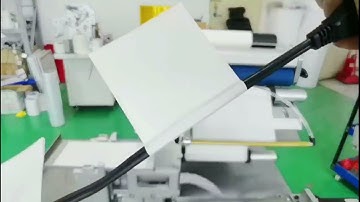 Flag tagging machine for flat cables