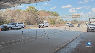 Power lines dangling from I-64 overpass damage cars