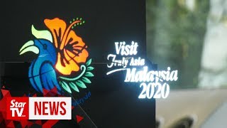 Dr M unveils VM 2020 logo, sets 30 million tourist arrivals target Dr M unveils VM 2020 logo, sets 30 million tourist arrivals target