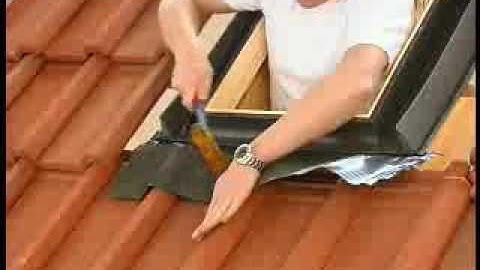 Skylight installation on tile roofing