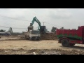 heavy equipment construction cambodia, excavator loading trucks in cambodia