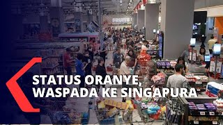 Status Corona Oranye, Kemlu Tingkatkan Status Perjalanan ke Singapura