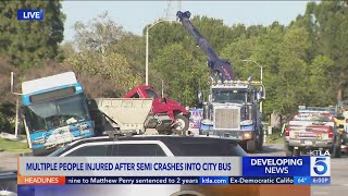 13 injured after semi-truck crashes into bus in Santa Clarita