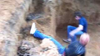 Me and friends breaking down a dirt wall