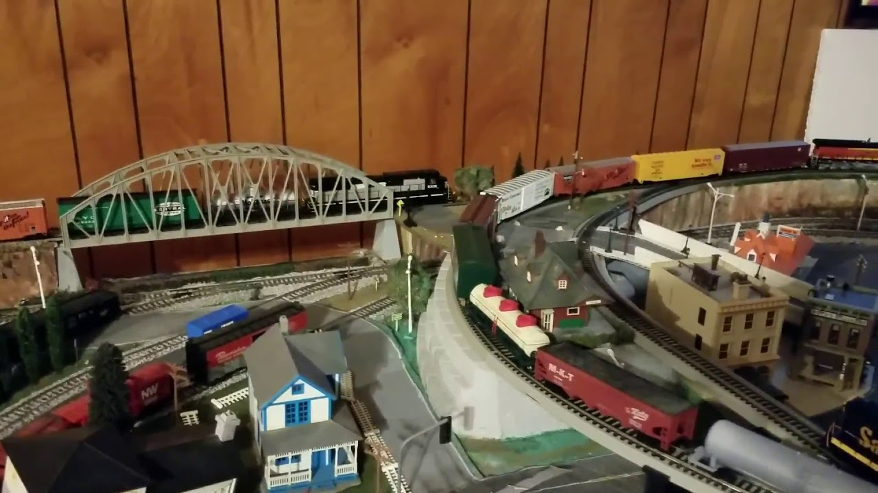 Operating 3 trains simultaneously on my Libraryville layout. NS, BNSF ...