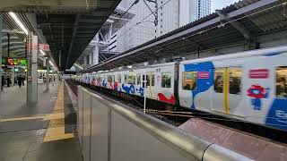 大阪環状線323系LS20編成2025大阪関西万博ラッピング列車大阪駅入線