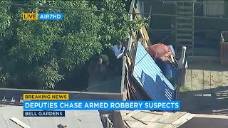 CHASE: Suspects ditch car, jump from roof to roof to evade deputies in Bell Gardens | ABC7