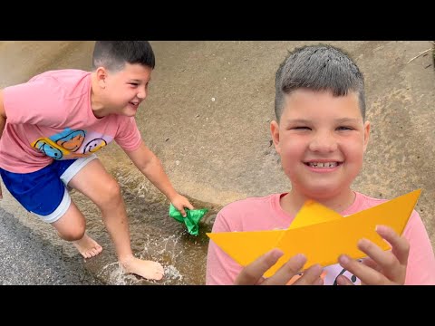 RAINY DAY FUN for Kids! How to Make a Paper Boat to Play with in the Rain Crafts for Kids w/ Caleb!