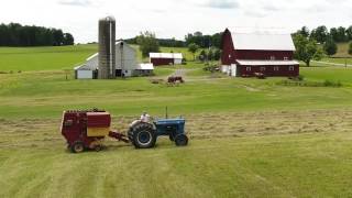 Drone Captures Tractor Baling Hay on a Beautiful Pennsylvania Farm