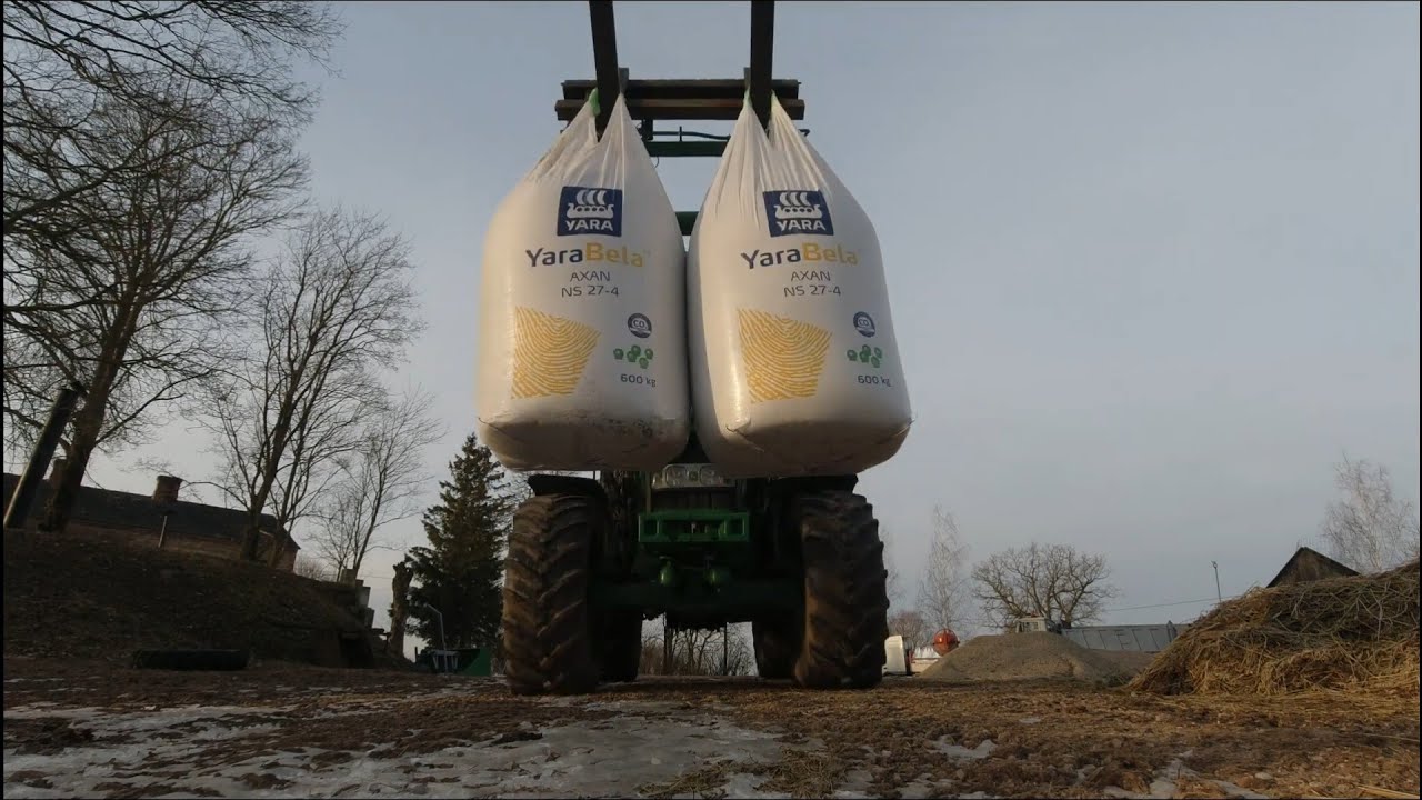 Разгрузка минеральных удобрений трактором John Deere 7530 /Unloading Fertilizer 