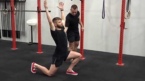 Walking lunge overhead reach