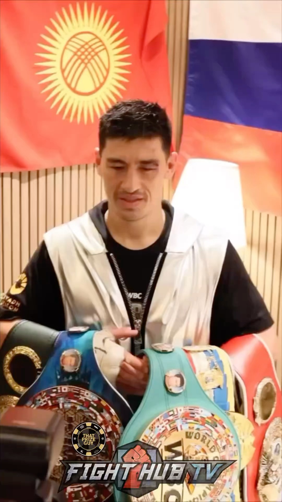 Dmitry Bivol flexes undisputed belts after Beterbiev win!