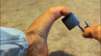 unlocking padlock with toes