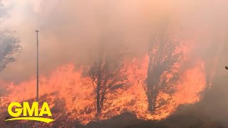 Tens of thousands evacuate as winds fuel more California fires l GMA