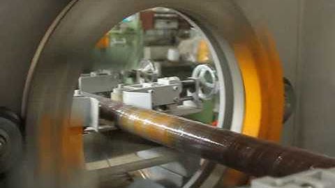 Rod orbital wrapepr and bar wrapping machine