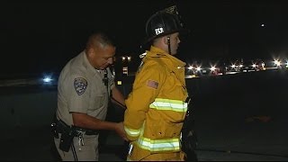 CHP officer handcuffs Chula Vista Firefighter caught on camera by CBS 8 image