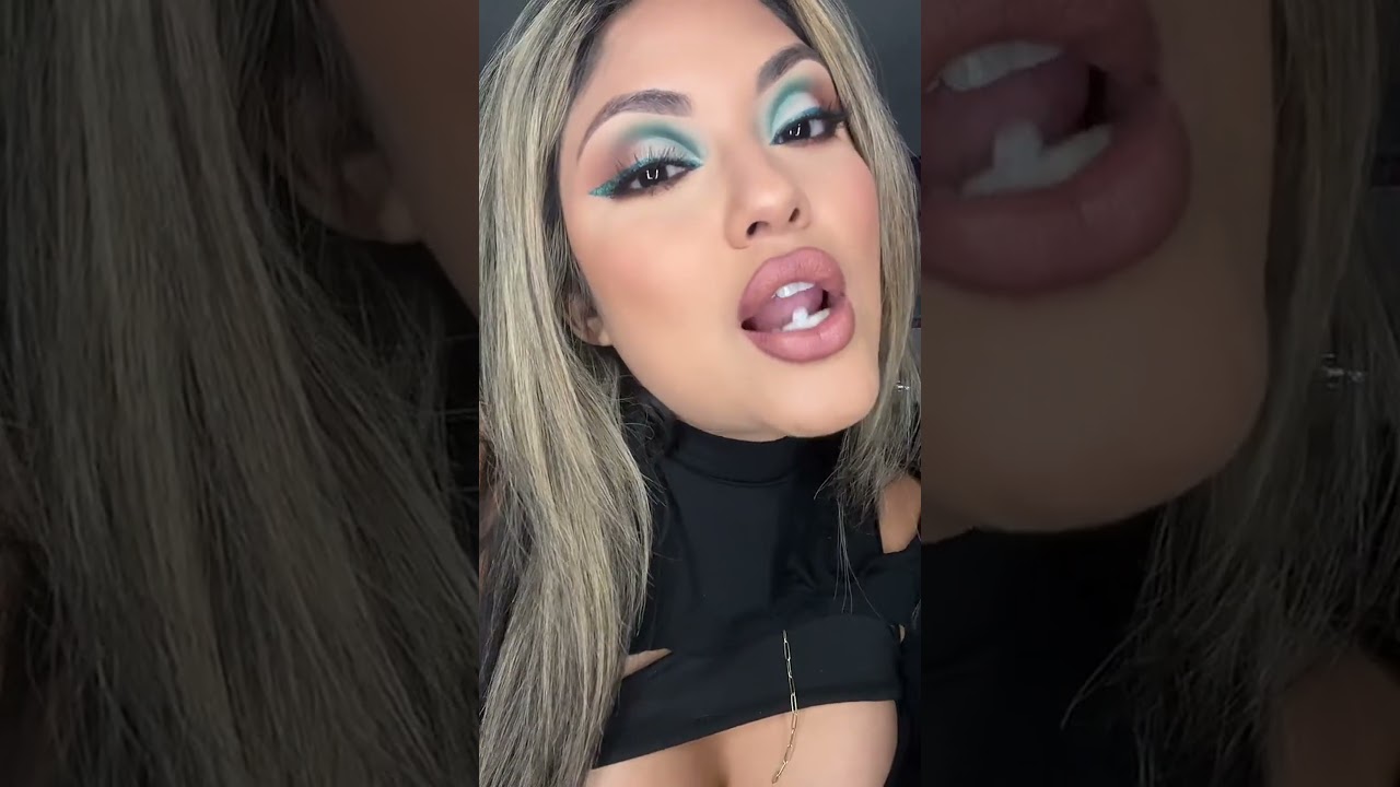 Bold Look: Woman's Glamorous Makeup & Confident Question