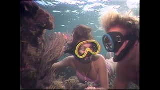 Woman Snorkels and Scuba Dives in Caribbean 1990s