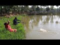 Fishing  traditional village man and lady have extraordinary fishing talent  catching fish