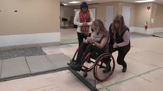 Manual Wheelchair Skill: Gets over obstacle, training with caregiver