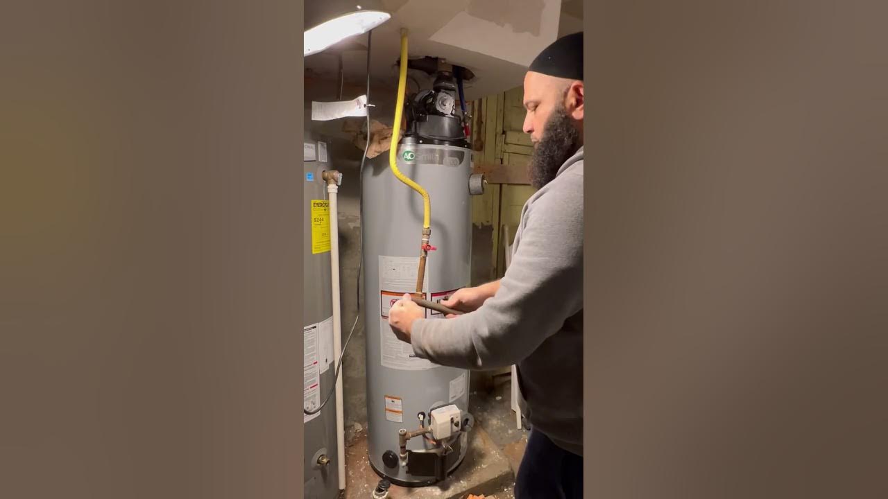 Replacing a faulty Rheem power vent gas water heater with a AO Smith