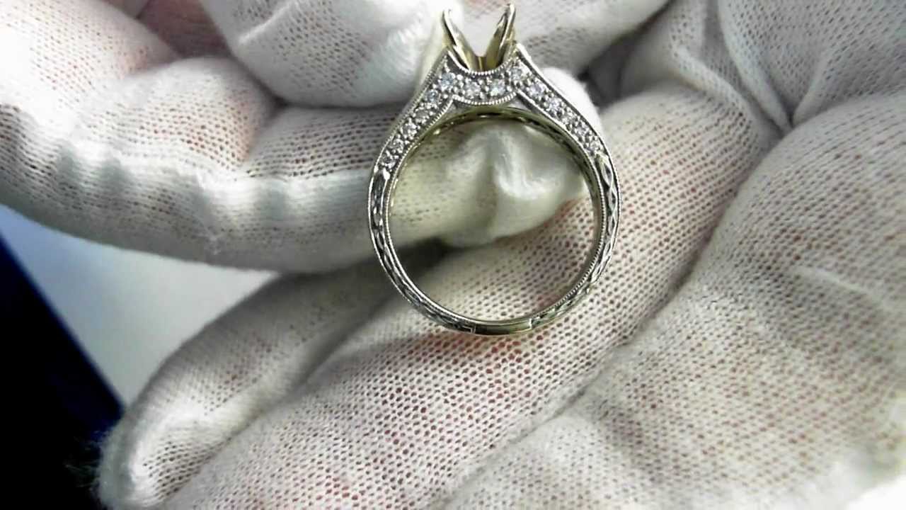 Engagement Ring - .71 G/VVS2 E.G.L. Certified Center, .88 cts tw sides, 14k