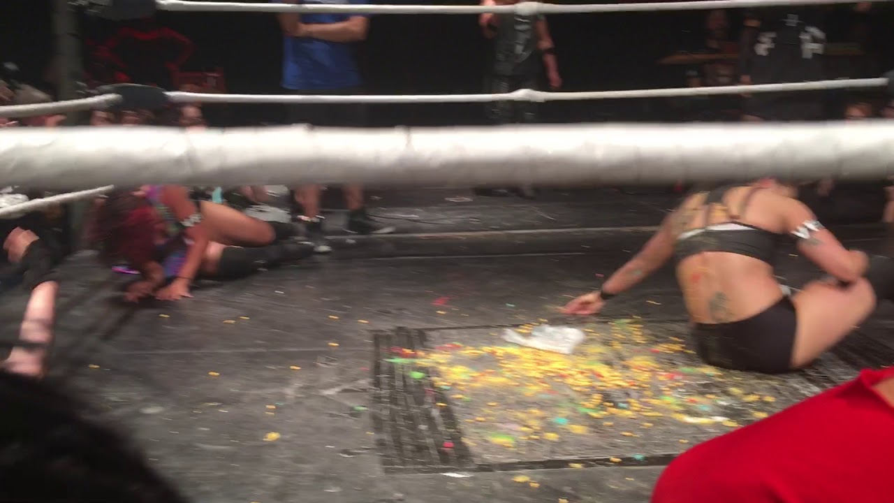 Hoodslam:  Nicole Savoy suplexes Cereal Man on the Crunch Berries
