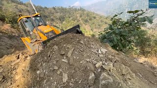 Excavator and JCB Backhoe Making the Road Easier for Mountain People Driving their Vehicles