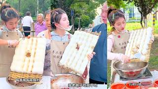 Handmade Tofu Sheets Filled and Served Fresh at Outdoor Food Stall
