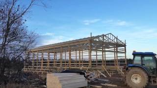 This is a simple video of a start to finish on me building my new cattle barn. It will house 20 head of beef cattle at a time and has lots 