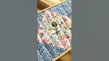 Economy Block Hot Pad (9x9) turned table runner. Fabric by Free spirit. #sewing #fabric