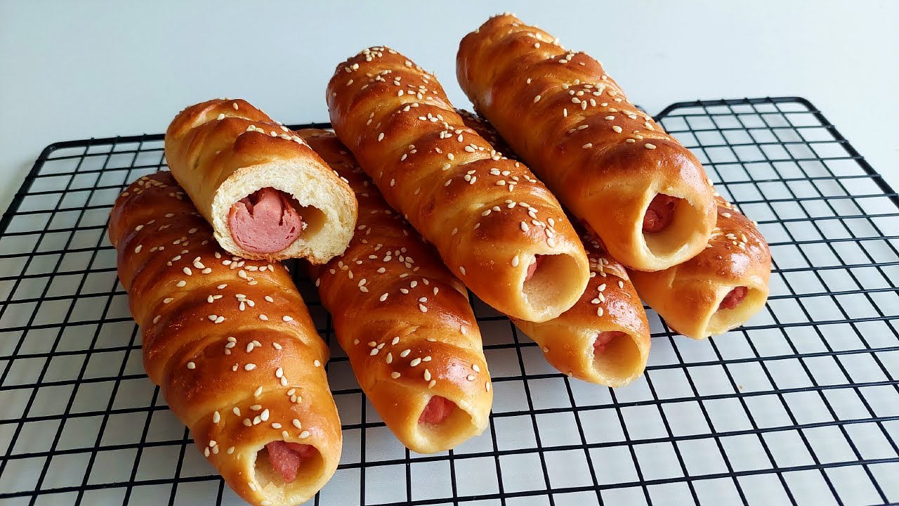 Kā pagatavot cīsiņus mīklā