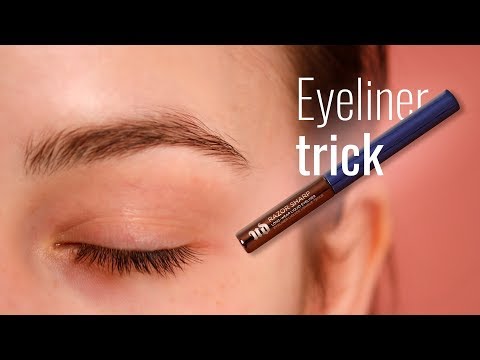 Lifting downturned eyes with an eyeliner