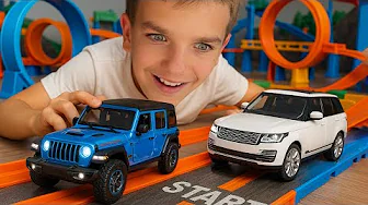Mark and Jeep Rubicon in 1:18 scale + trailer with tools save Range Rover