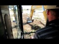 PC200 Stripping Top Soil Off a Pipeline