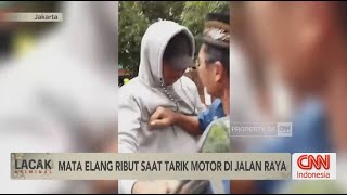Mata Elang Ribut Saat Tarik Motor di Jalan Raya