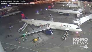 Video shows evacuation of Delta flight at Seattle airport after mechanical malfunction sparks fire