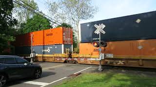 CSX intermodal rushes through Haworth Ave RR Crossing (5/14/23)