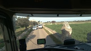 POV MB trucks Taranto&#39;s road,red wine load