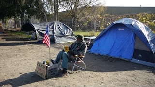 Eli used to own his own business. He now lives in a tent city homeless!