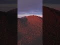 When the desert mountains decide to put on a light show! This twilight scene is pure, rugged magic.