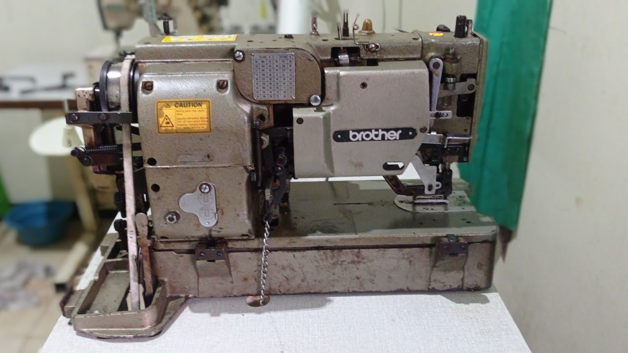 Mesin lobang kancing brother jalannya lambat