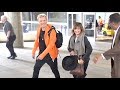 Billy Idol And A Lady Friend Arrive At LAX