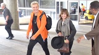 Billy Idol And A Lady Friend Arrive At LAX Profile