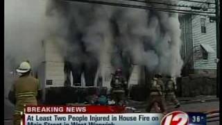Fire tears through West Warwick house