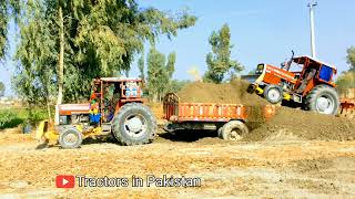 Mf 385 Loading Tractor Trolley With Front Blade.