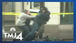Man tackled by Milwaukee Police after grabbing suspicious package screenshot 5